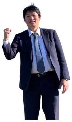 ガッツポーズをする男性社員